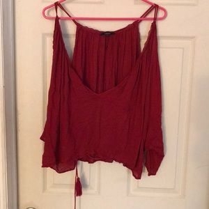 A flowy red top.